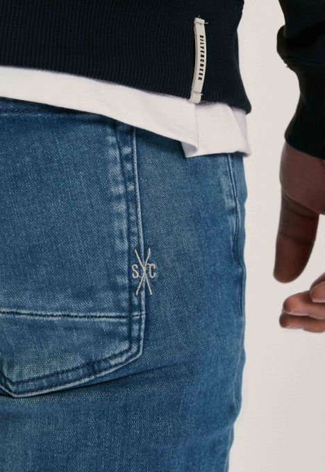 Porter Slim Tapered Jeans